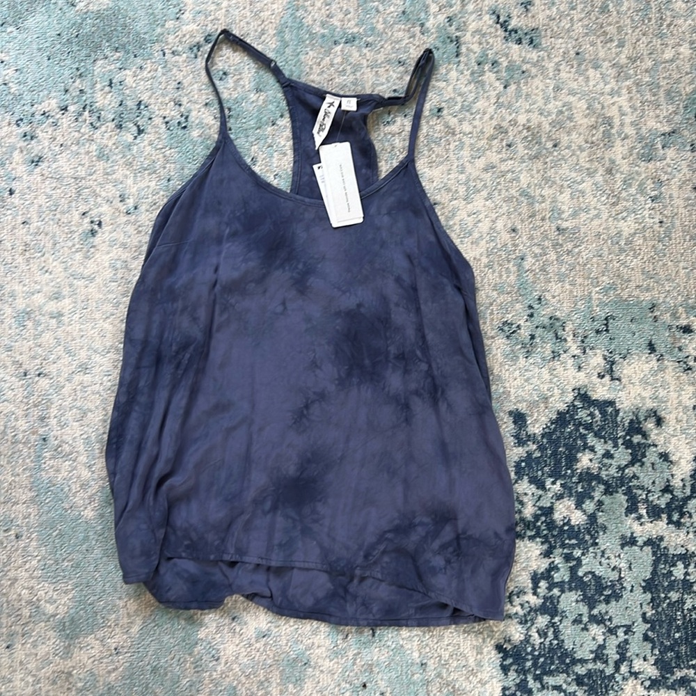Tie dye blue tank top from Tilly’s. Never worn. Size small.